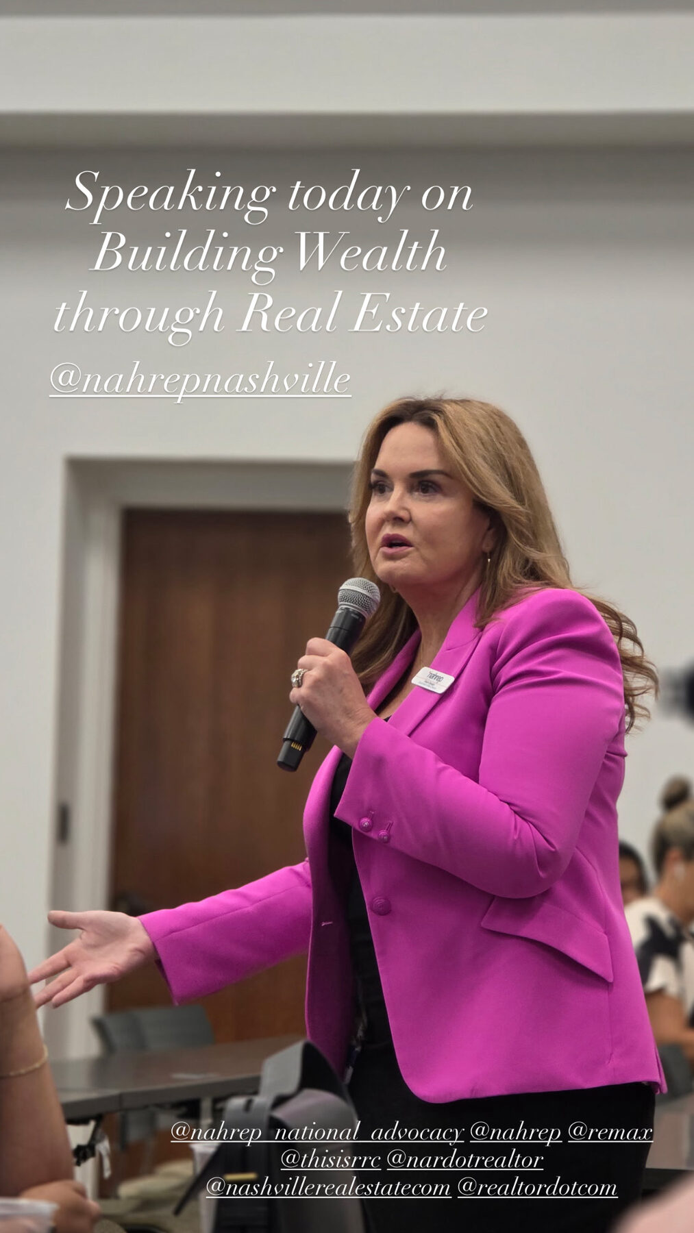 Debra speaking at an industry event