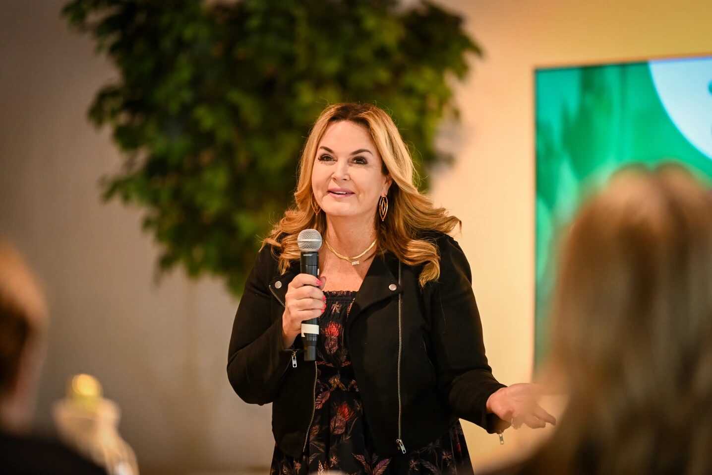 Debra speaking to a room